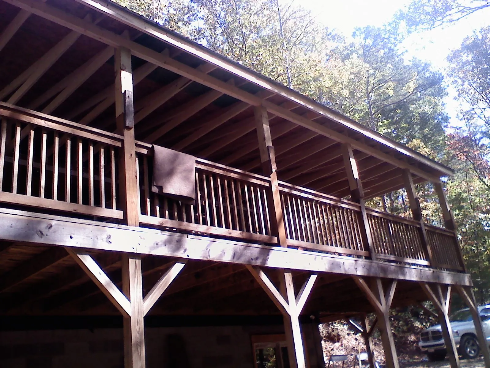 Timber framing under a new elevated porch and deck — Roof Leak Repair in South Barre by Roofing Brothers